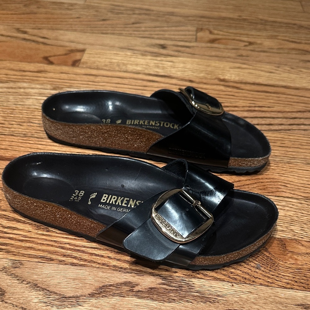 Birkenstock Black Mules with Gold Buckle
